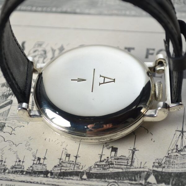 Final pocket watch conversion construction — sliding link mechanism with internal grooves, worn on the wrist